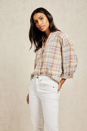 Earthy browns and soft blues add charm to the Bouvardia women’s checked shirt. Button-up design is woven from a breathable linen-cotton blend and detailed with a flattering cut-away neckline. Boyfriend fit. Casual wear. Size XS, S, M, L, XL. Made in Portugal. Machine wash.