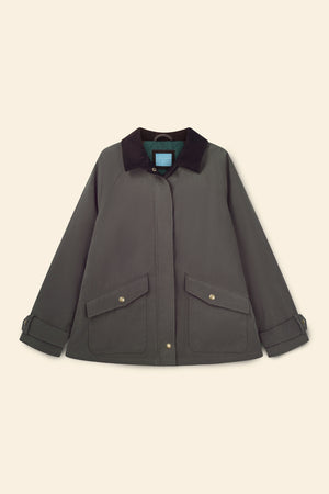 Dark gray jacket with a fur collar on a beige background
