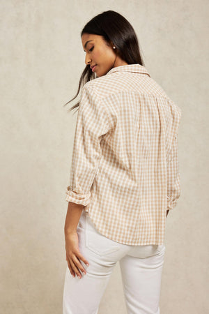 The Ashley women’s shirt is woven from cotton with a smidge of stretch. Gingham check shirt with keyhole cuff opening detail. Patterned with soft gingham checks. Casual wear. Size XS, S, M, L, XL. Made in Portugal. Machine wash.