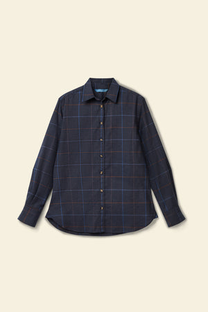 Blue plaid shirt on a beige background