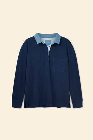 Navy long-sleeve shirt with light blue collar on a beige background