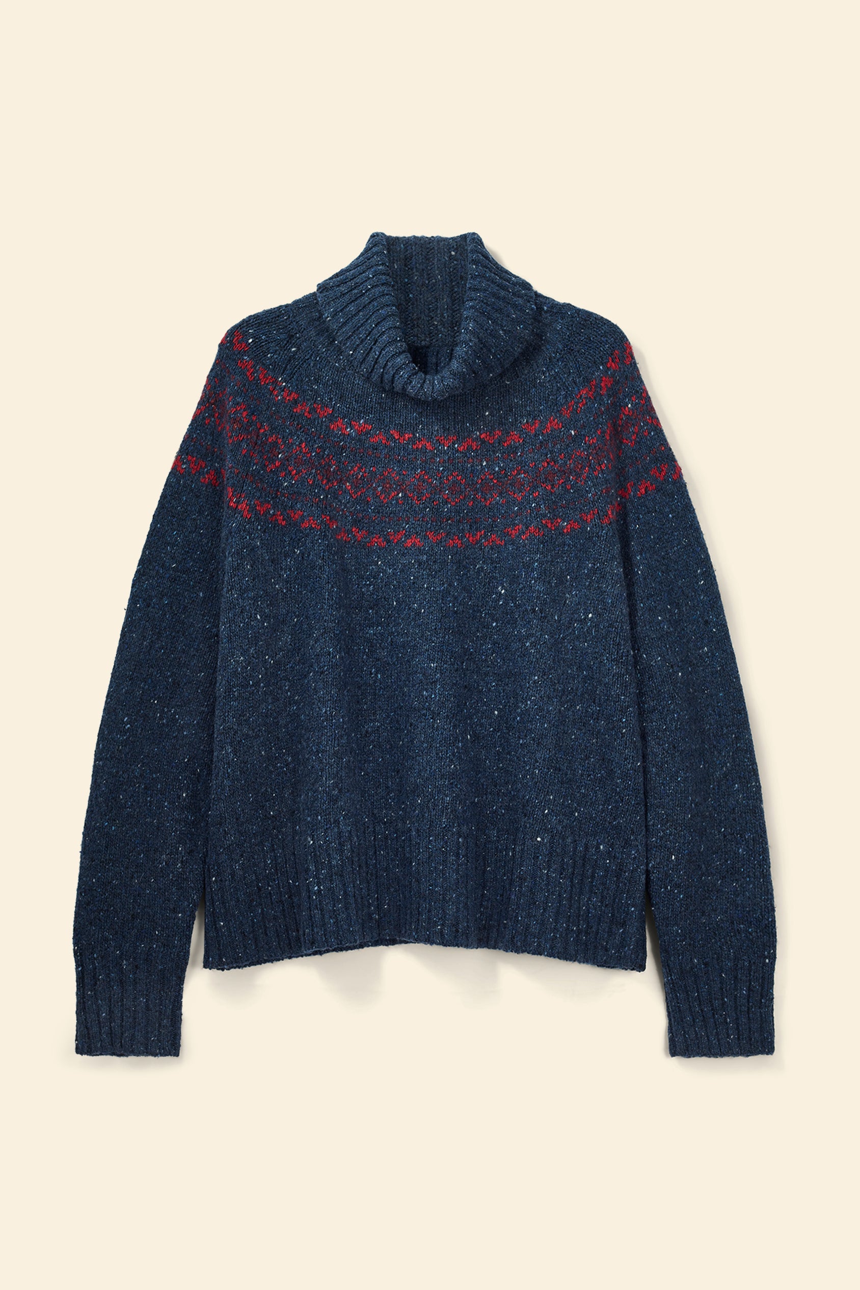 Blue sweater with a patterned collar on a beige background