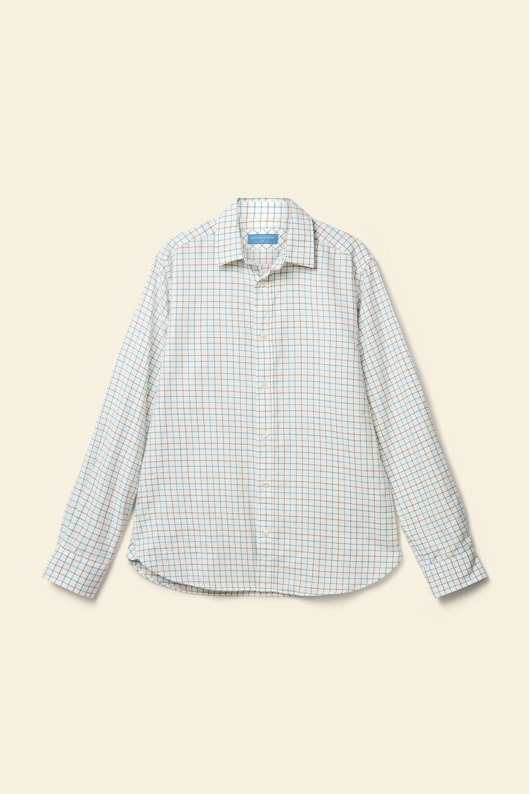 Checkered shirt on a beige background