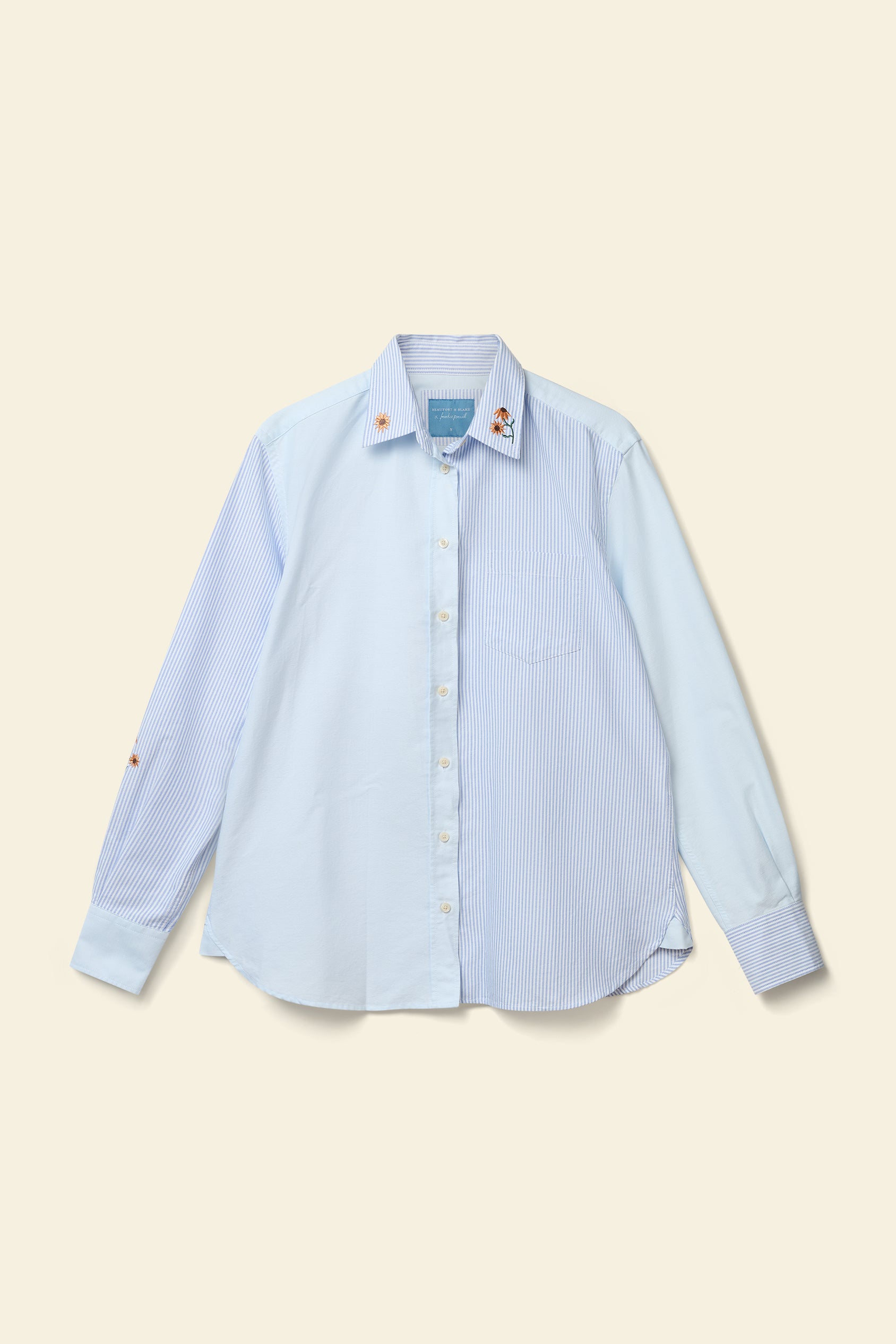 Light blue striped shirt on a beige background