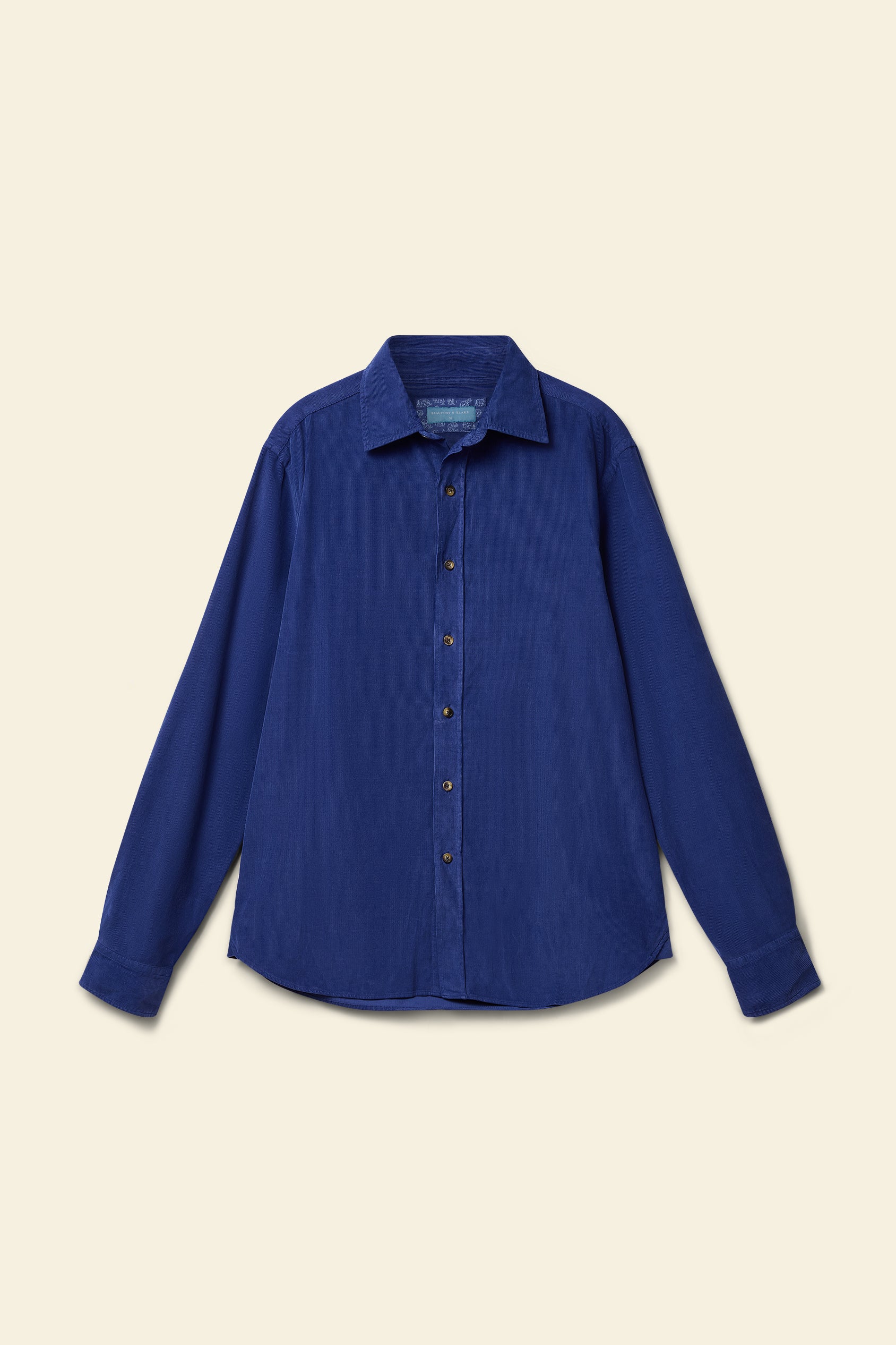 Blue shirt on a beige background