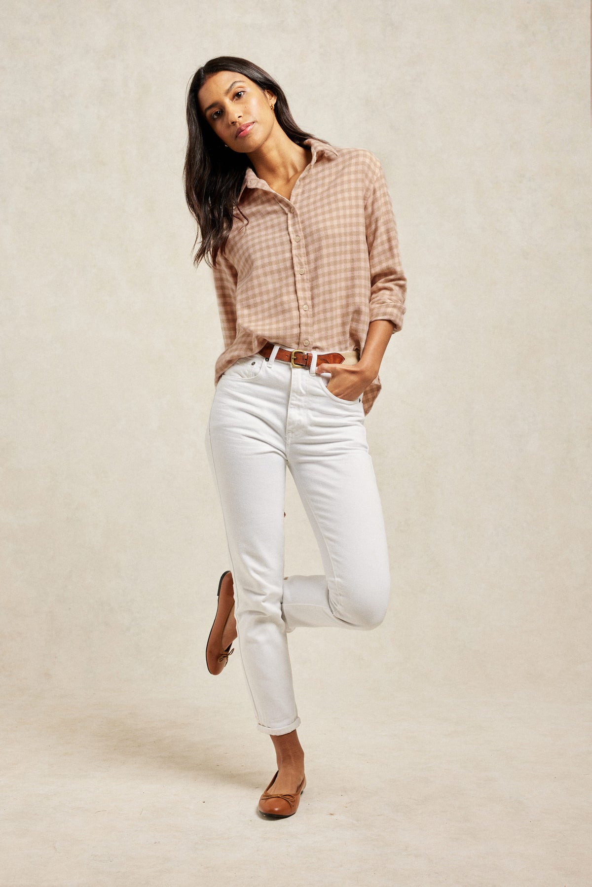 Soft brushed pale pink and light brown cotton gingham check women’s shirt. With centre back box pleat and curved hem for extra ease. Cut from brushed cotton to a boyfriend fit. Casual wear. Size XS, S, M, L, XL. Made in Portugal. Machine wash.