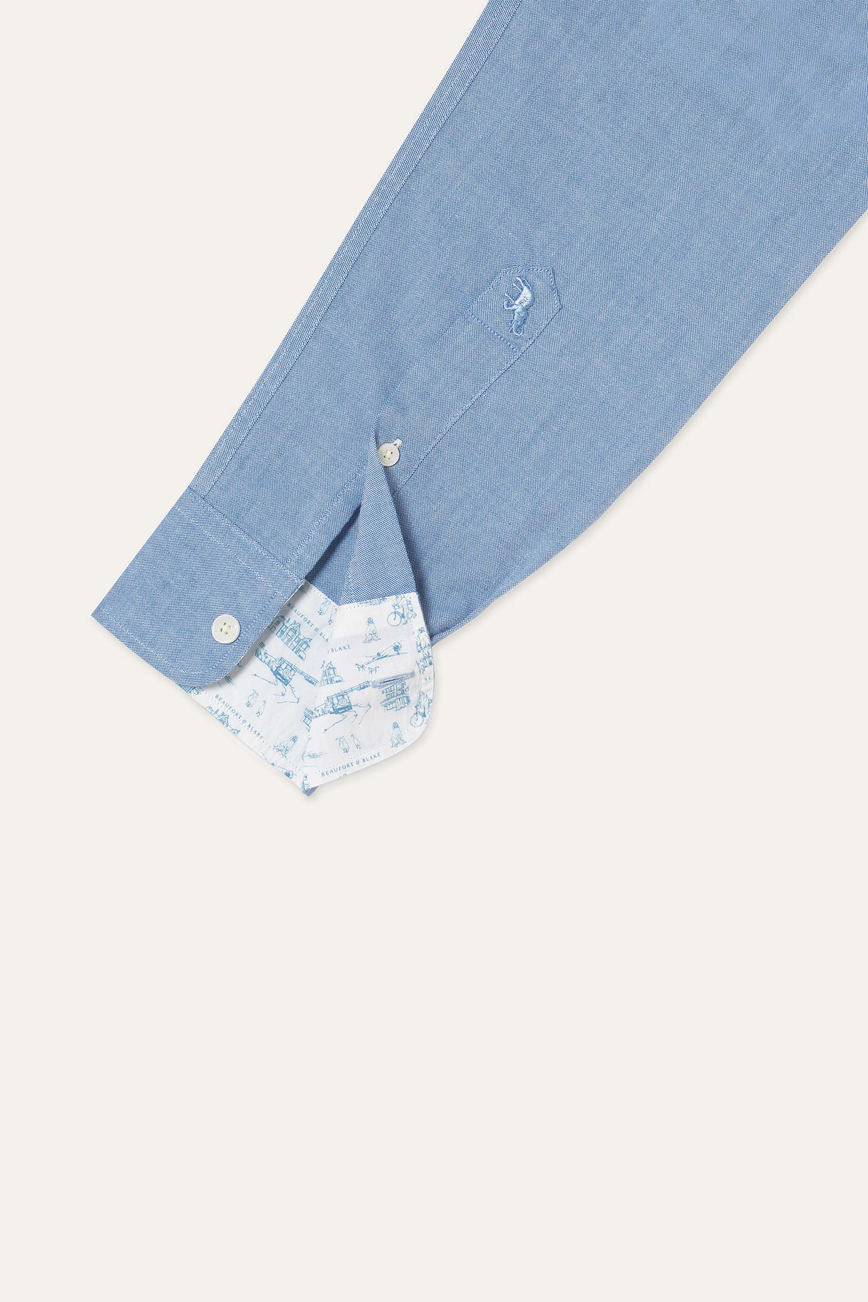 A vintage-wash blue Men’s Oxford Shirt. 100% Cotton. Subtle Beaufort embroidery and a button-down collar adds to the design. Classic style. Made in Portugal. Machine wash. Size S, M, L, XL, XXL.