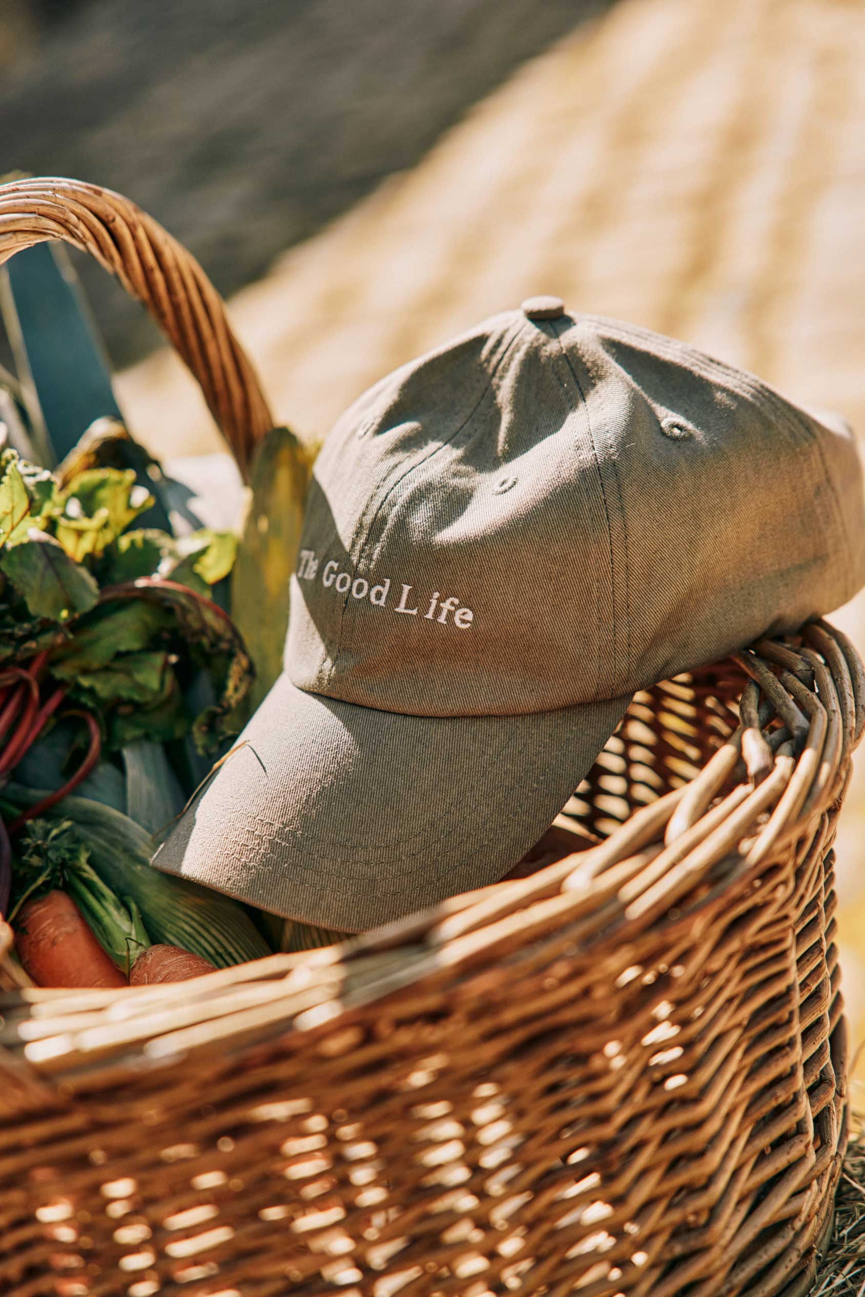 Washed sage green cap with 'The Good Life' embroidery centre front 100% Cotton Adjustable back strap with brass fastening and eyelets.