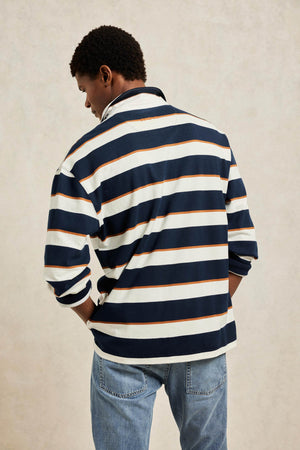 Yarn dyed men’s navy blue and white stripe rugby shirt with a vintage classic collar and soft peached finish. 100% Cotton. Casual wear. Machine wash. Size S, M, L, XL, XXL.
