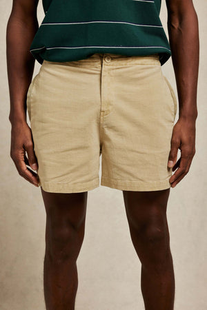 Drawstring men’s rugby shorts, garment dyed sand beige for a vintage look. Cut from cotton to an old-school rugby design with a drawstring waist. Casual wear. Machine wash. Size 30,32,34,36,38.