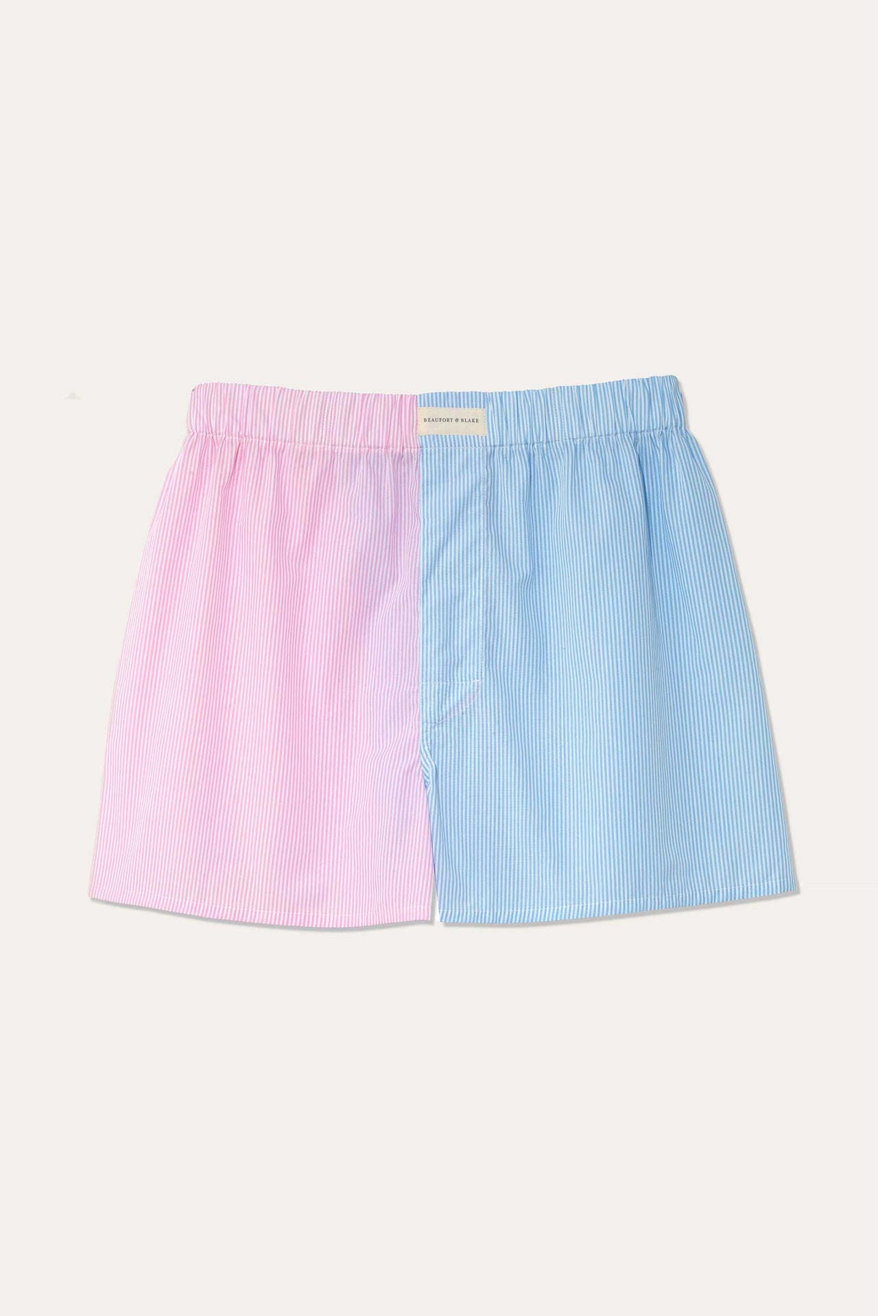 Fine stripe pink and blue colour block poplin boxers. Elasticated waistband and extra rear seat panel for added comfort. Made in Portugal. Machine Wash. Underwear. Size S, M, L, XL, XXL.