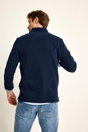 The Frampton Navy Half Zip Sweat is an all-rounder, crafted to a classic half-zip design with elephant embroidery at the chest. Extra kudos when layered over an Oxford shirt. 100% cotton and made in Portugal.