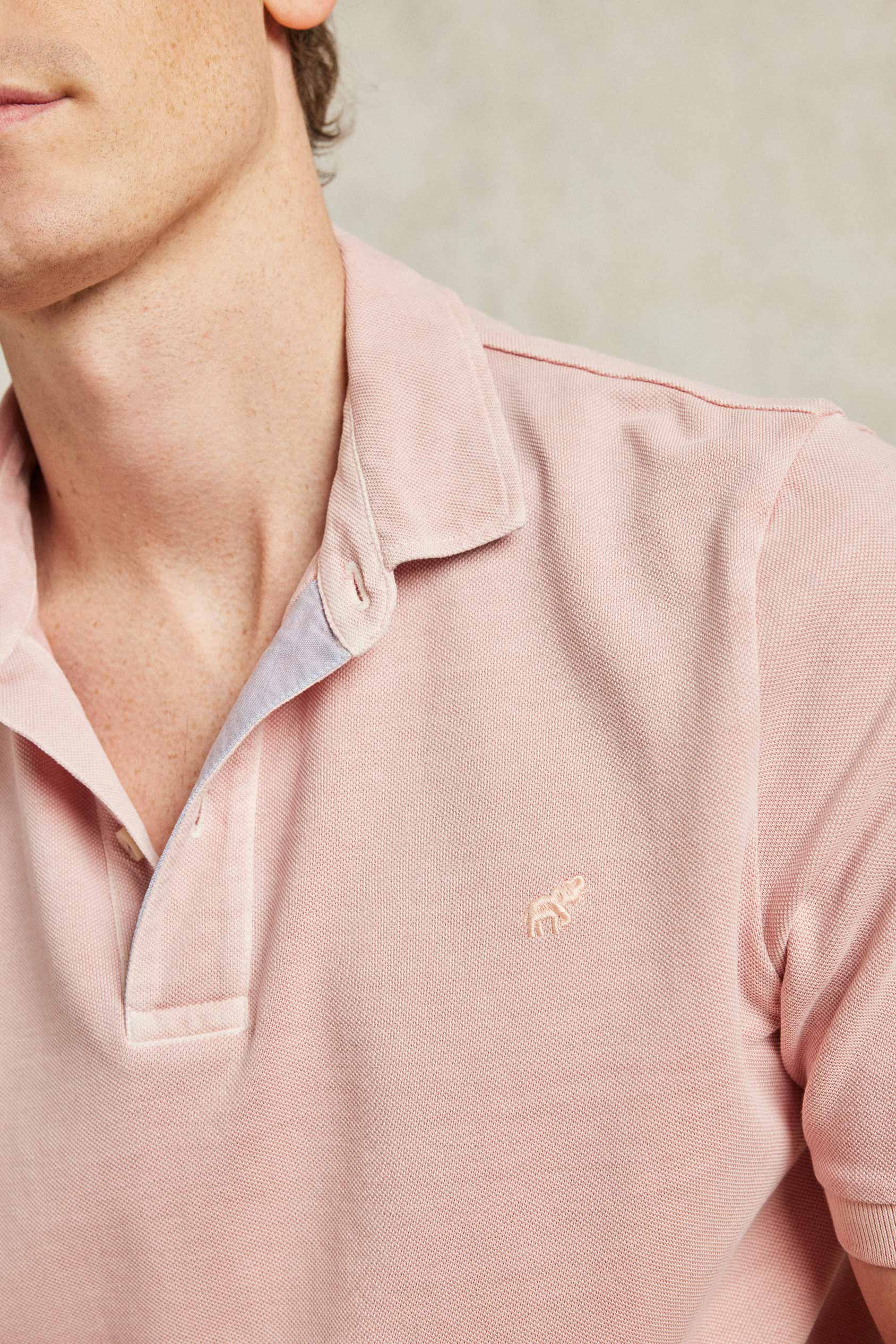 Classic cotton pique garment dyed men’s pink polo shirt washed for a soft touch. 100% cotton. With a subtle faded wash. Casual wear. Machine wash. Size S, M, L, XL, XXL.