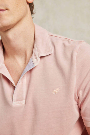 Classic cotton pique garment dyed men’s pink polo shirt washed for a soft touch. 100% cotton. With a subtle faded wash. Casual wear. Machine wash. Size S, M, L, XL, XXL.