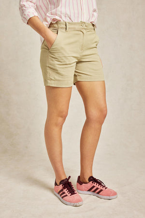 Totton oat chino women’s shorts cut from stretch cotton to a flattering high-waisted fit. Pockets on the front and back. Garment dyed for a vintage look. Size 6,8,10,12,14,16,18. Made in Portugal. Machine wash.